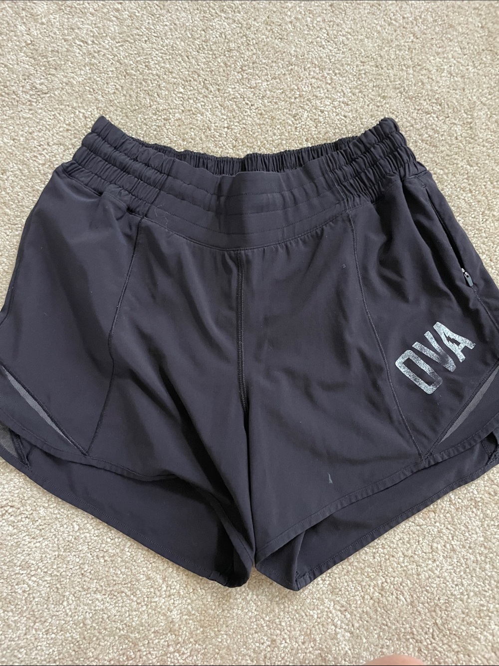 Lululemon, Hottie Hot, size 4 Tall, OVA logo